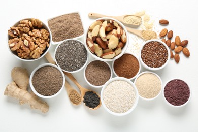 Photo of Different superfoods on white background, flat lay