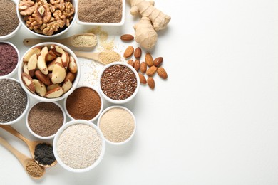 Photo of Different superfoods on white background, flat lay. Space for text