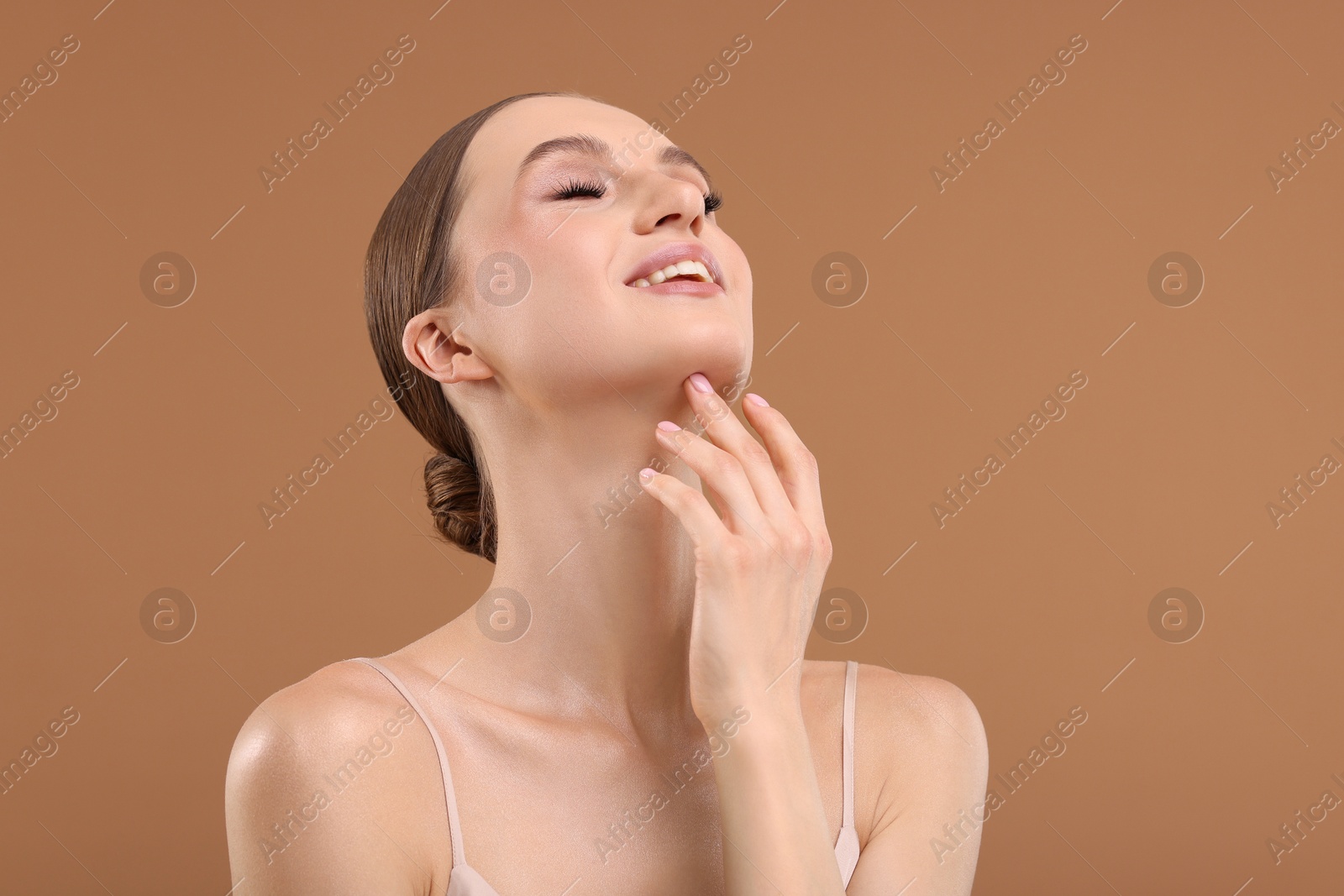 Portrait of beautiful young woman on beige background, space for text Photo of Portrait of beautiful young woman on beige background, space for text