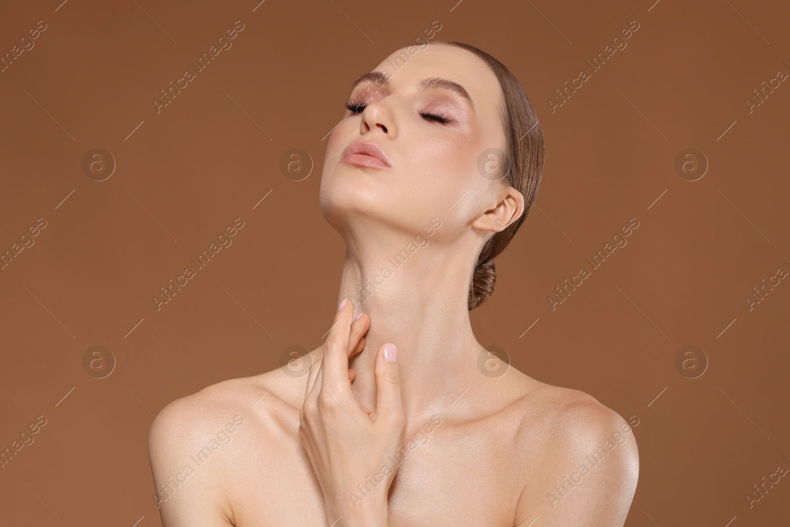 Portrait of beautiful young woman on beige background Photo of Portrait of beautiful young woman on beige background