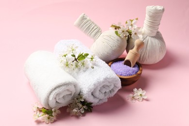 Photo of Spa composition with beautiful flowers on pink background
