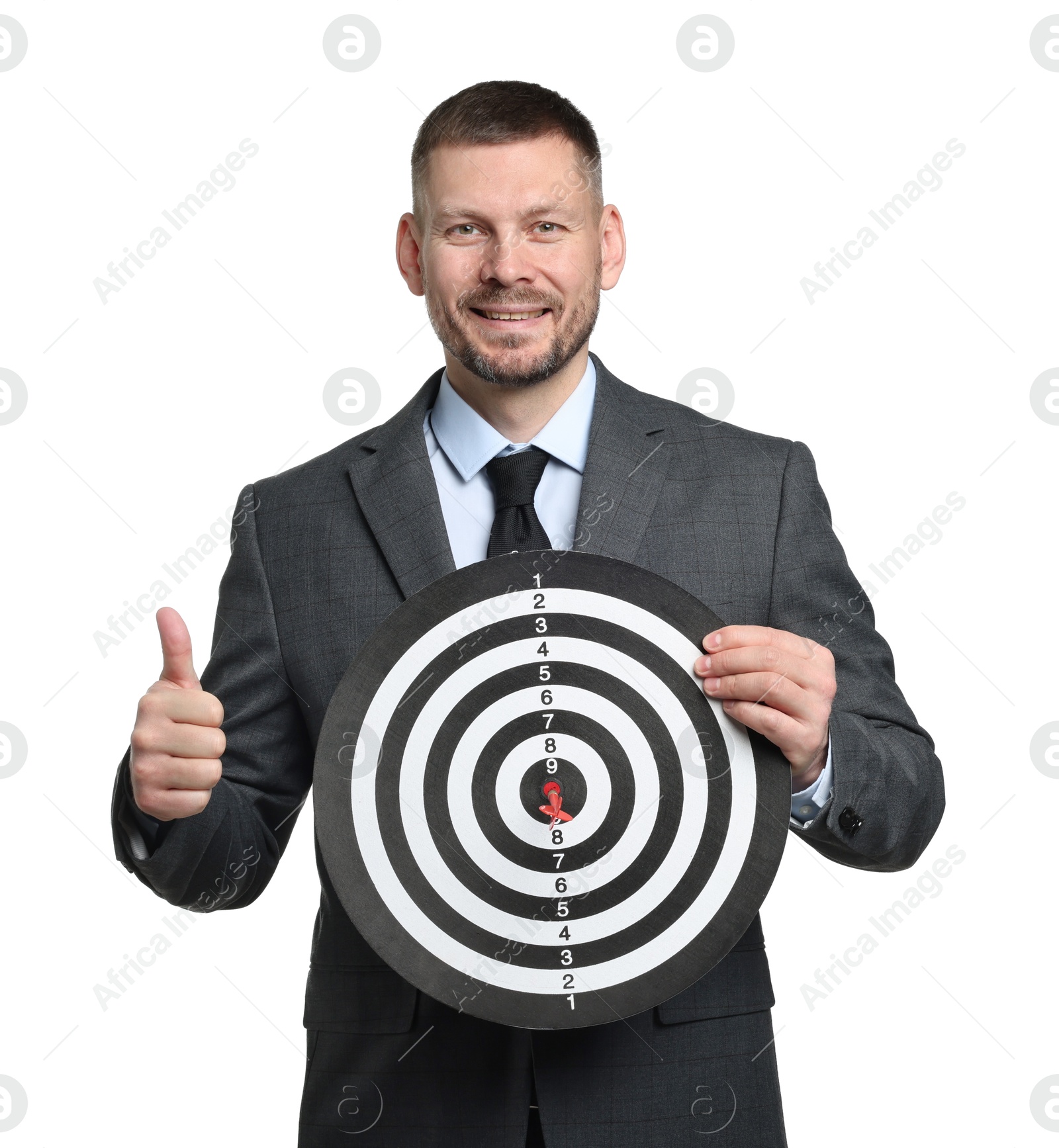 Targeting. Man with dart board showing thumbs up on white background Photo of Targeting. Man with dart board showing thumbs up on white background