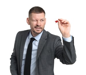 Photo of Targeting. Man with dart aiming on white background