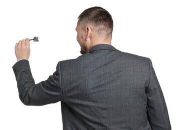 Photo of Targeting. Man with dart aiming on white background, back view