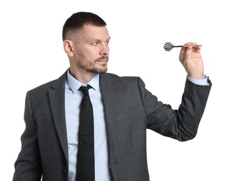 Photo of Targeting. Man with dart aiming on white background