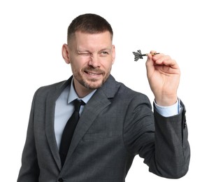 Photo of Targeting. Man with dart aiming on white background