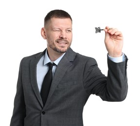 Photo of Targeting. Man with dart aiming on white background