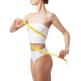 Photo of Woman with slim body and measuring tape on white background, closeup