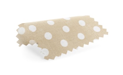 Photo of Sample of beige fabric with polka dot isolated on white