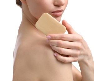 Photo of Woman with soap bar on white background, closeup