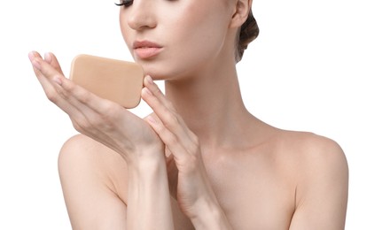 Photo of Woman with soap bar on white background, closeup