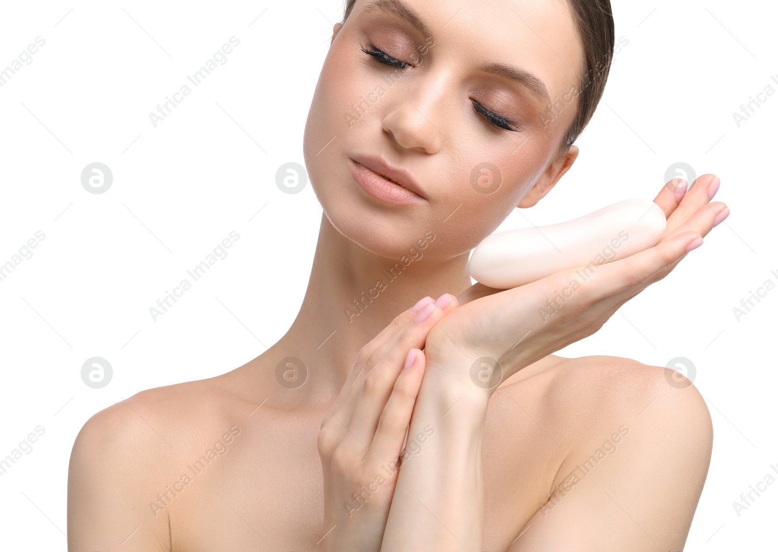 Beautiful woman with soap bar on white background Photo of Beautiful woman with soap bar on white background
