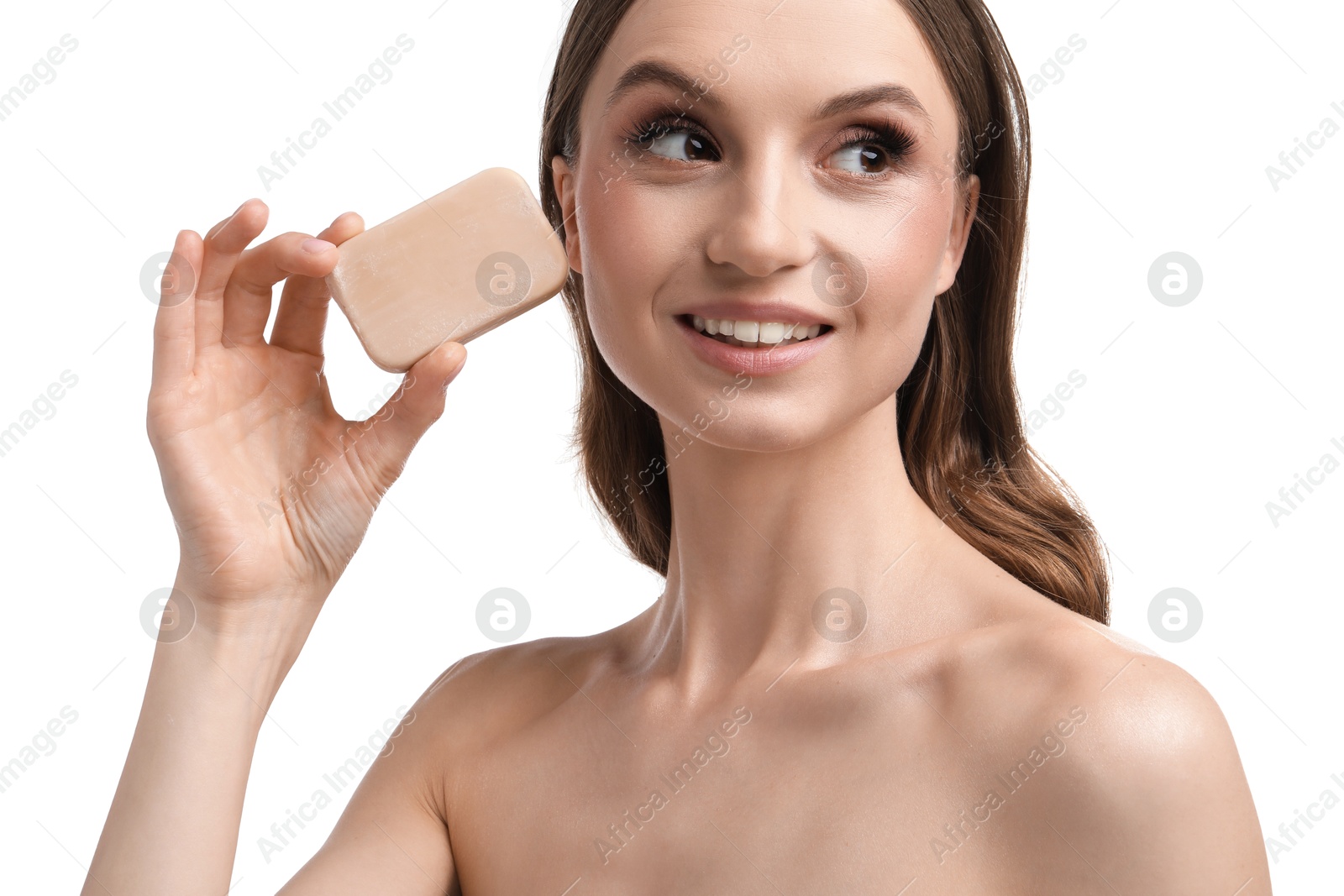 Photo of Smiling woman with soap bar on white background, closeup