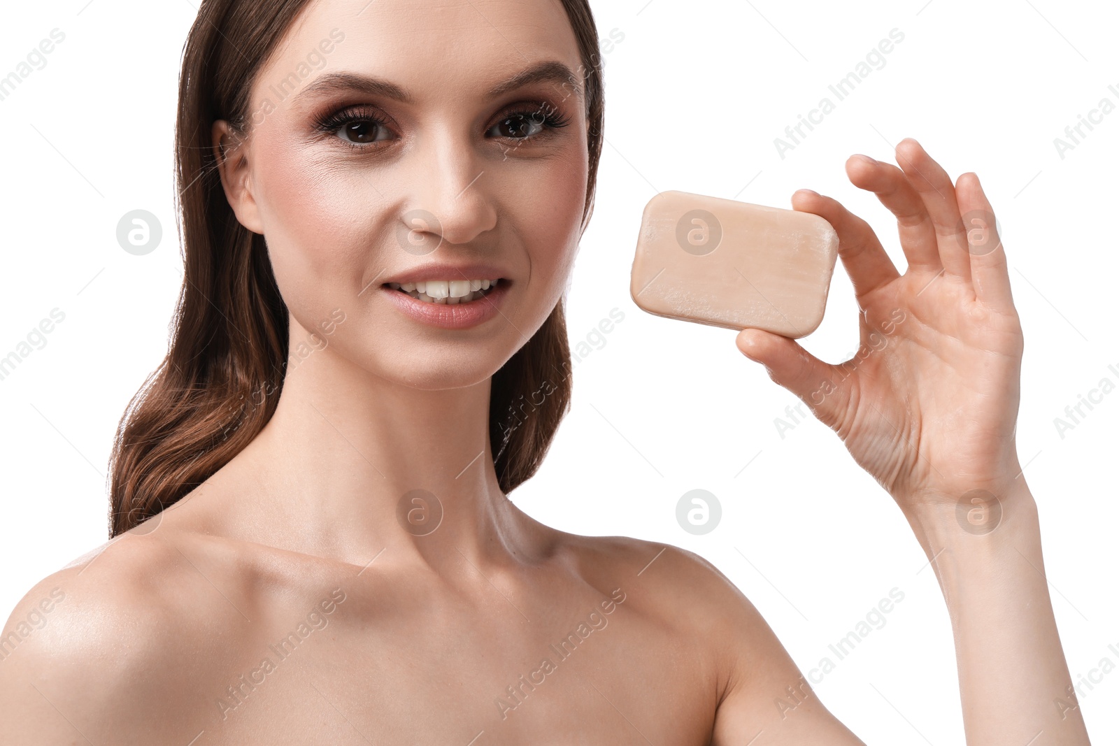 Photo of Smiling woman with soap bar on white background, closeup