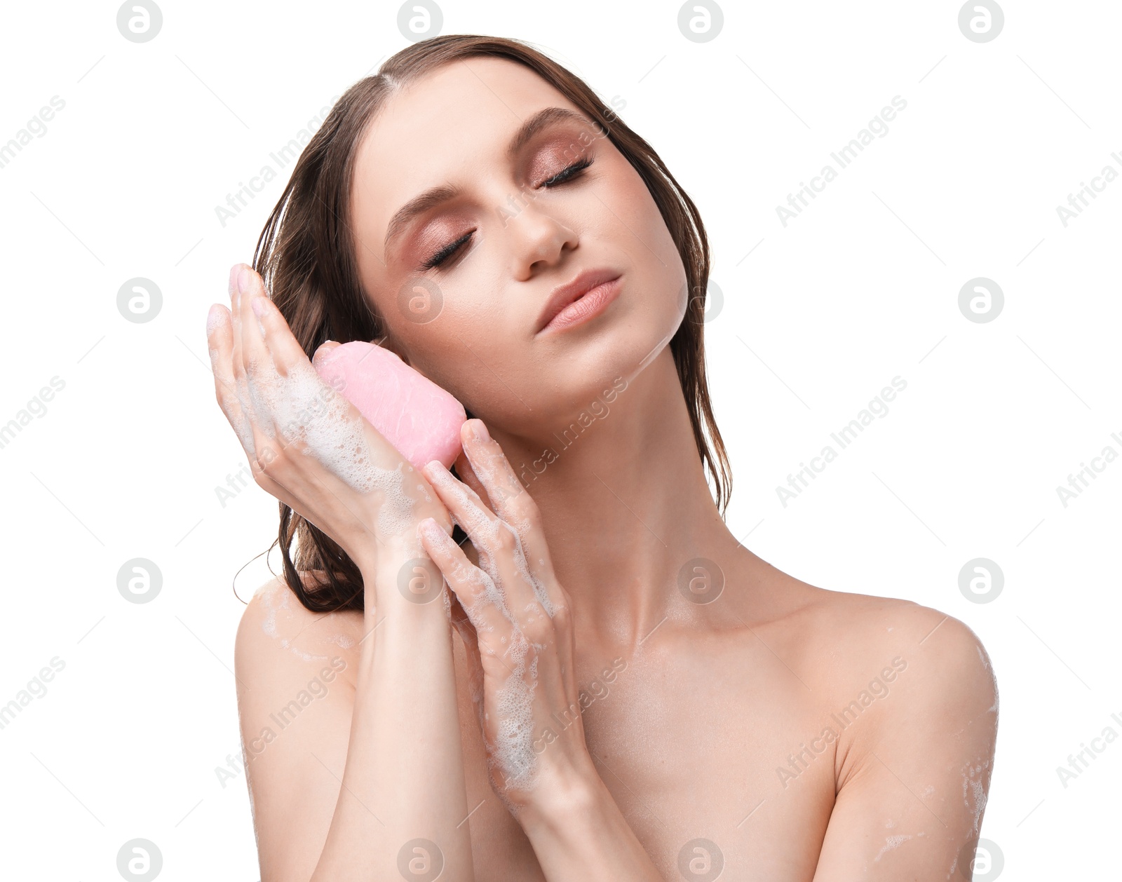 Beautiful woman with foaming soap bar on white background Photo of Beautiful woman with foaming soap bar on white background