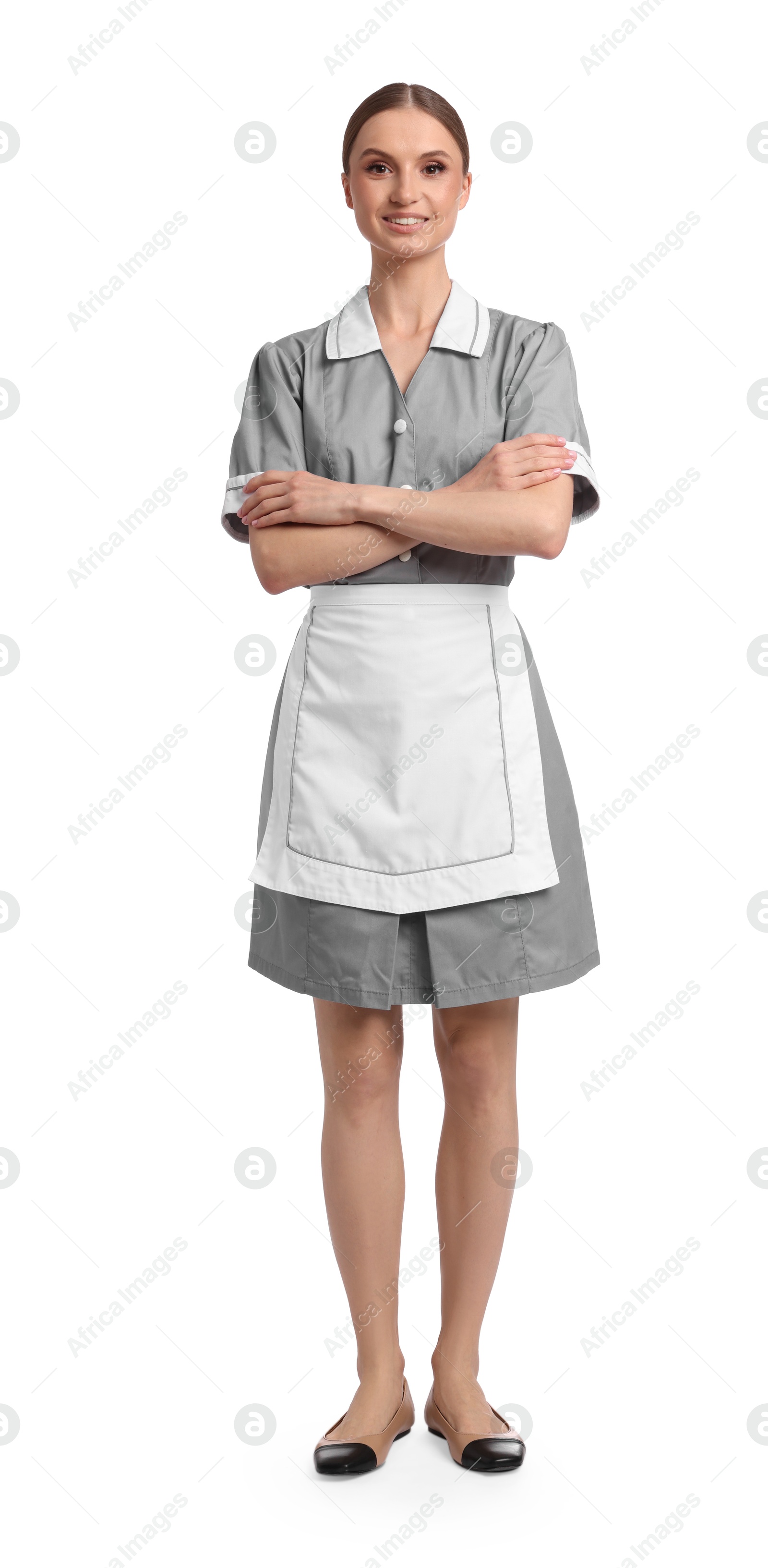 Full-length portrait of smiling chambermaid on white background Photo of Full-length portrait of smiling chambermaid on white background