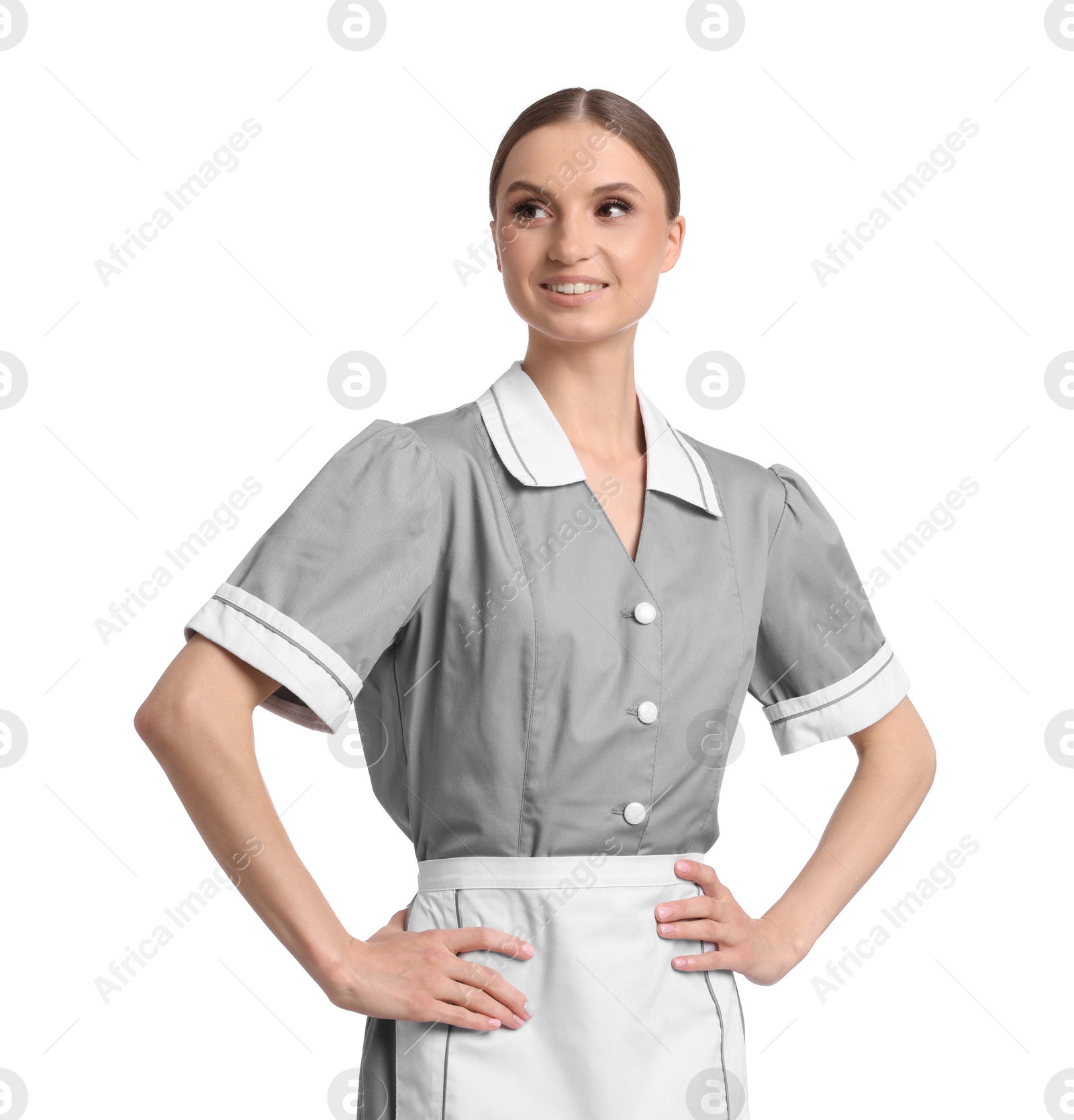 Portrait of smiling chambermaid on white background Photo of Portrait of smiling chambermaid on white background