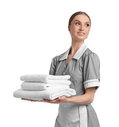 Photo of Chambermaid with stack of clean towels on white background