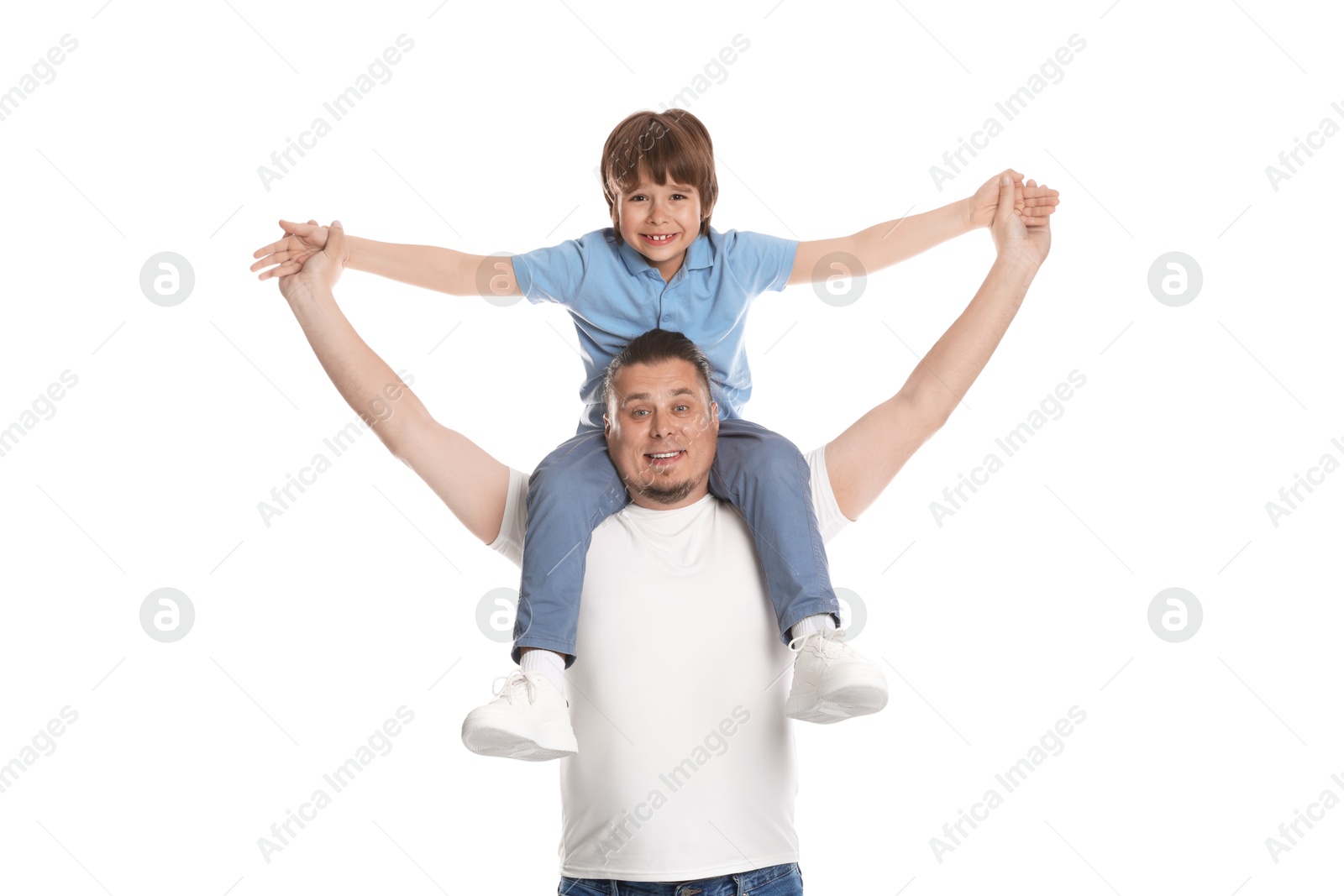 Father and his son having fun together on white background Photo of Father and his son having fun together on white background
