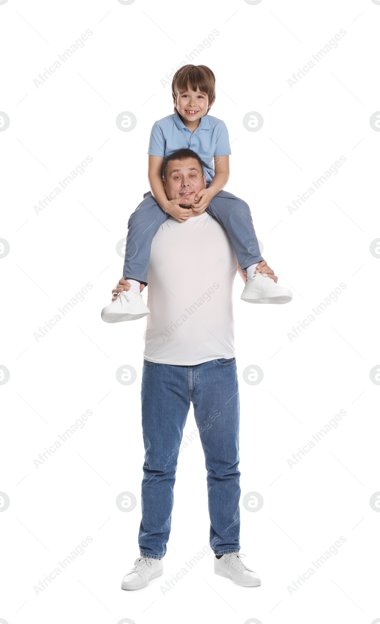 Father and his son having fun together on white background Photo of Father and his son having fun together on white background