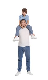 Photo of Father and his son having fun together on white background