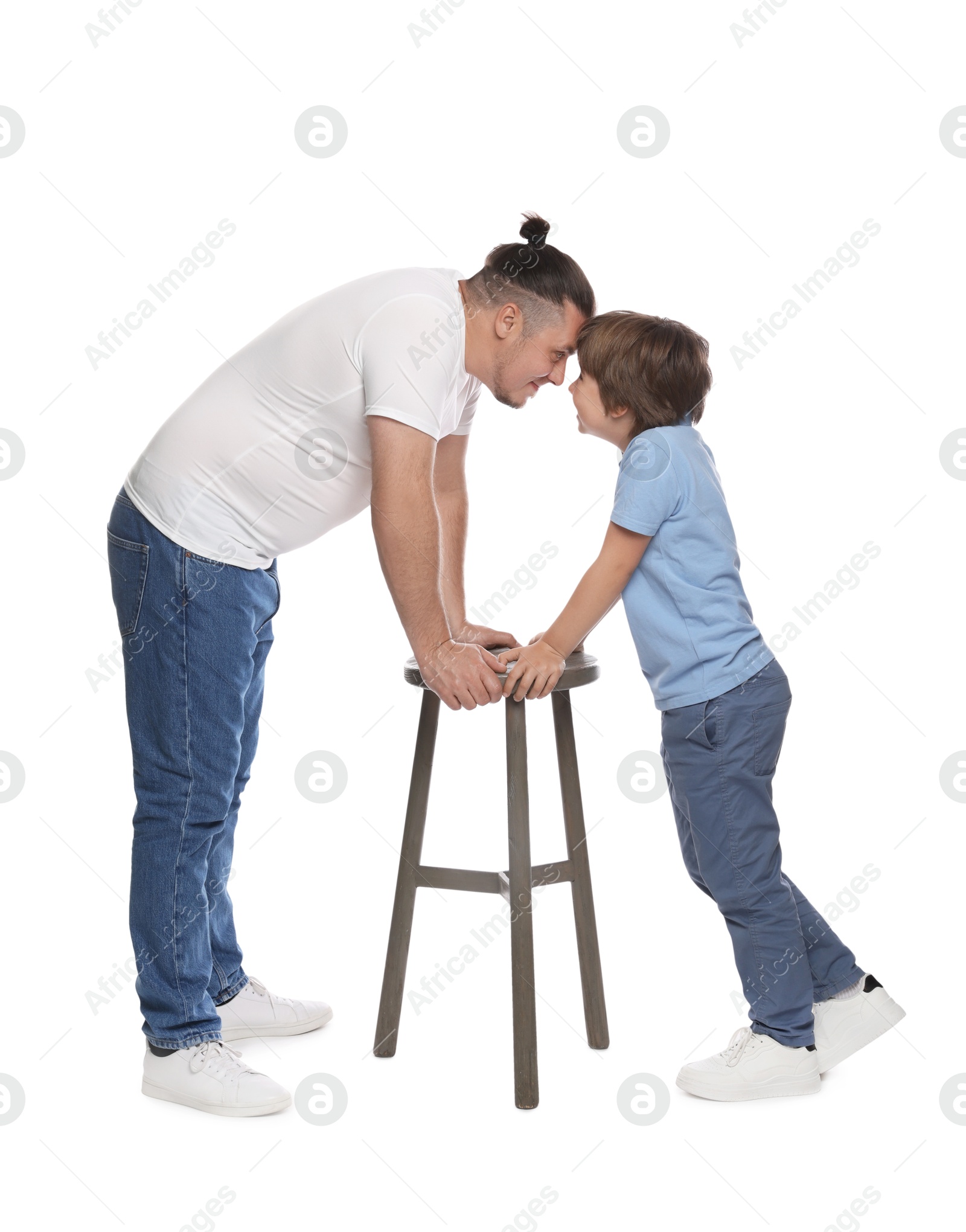Father with his son on white background Photo of Father with his son on white background