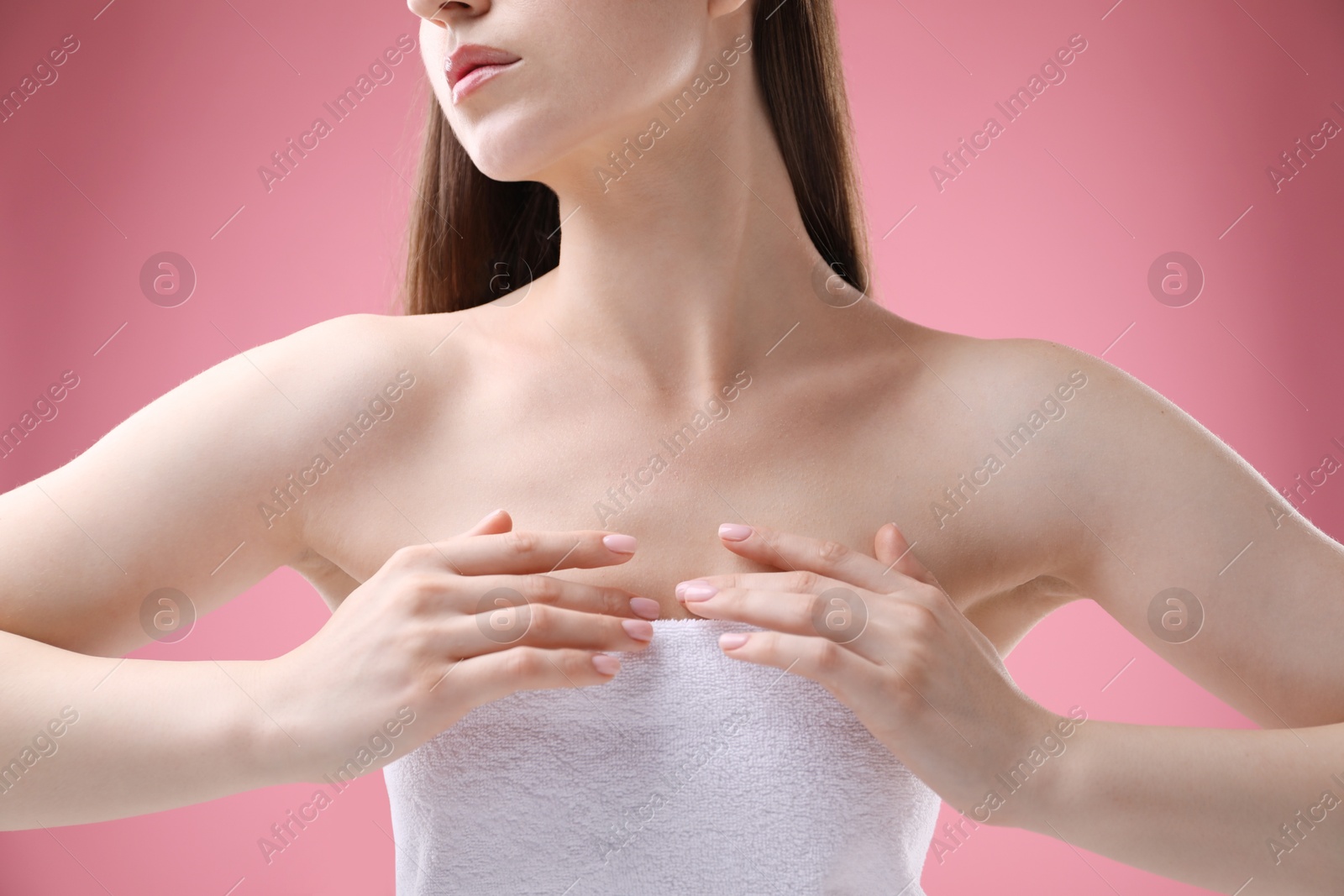 Woman with beautiful collarbones and neck on pink background, closeup Photo of Woman with beautiful collarbones and neck on pink background, closeup