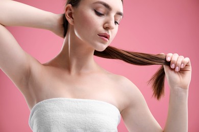 Photo of Woman with beautiful body on pink background, closeup