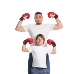 Photo of Father and his son in boxing gloves on white background