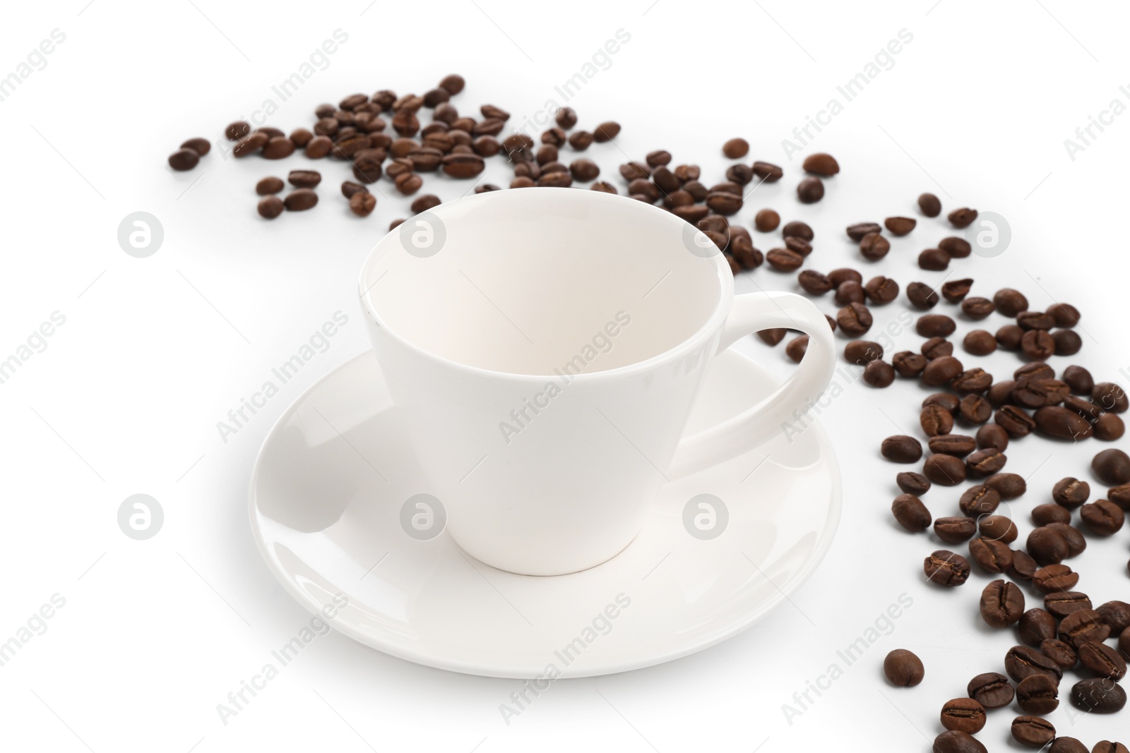Ceramic cup with roasted coffee beans isolated on white Photo of Ceramic cup with roasted coffee beans isolated on white