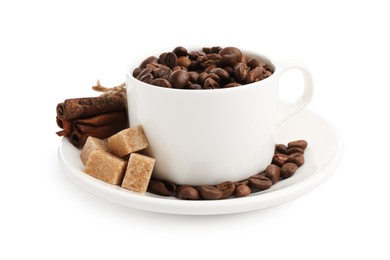 Photo of Ceramic cup with roasted coffee beans, sugar and cinnamon isolated on white