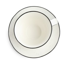 Photo of Empty coffee cup with saucer isolated on white, top view