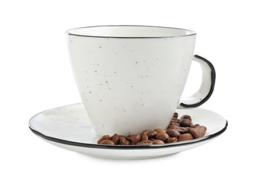Photo of Ceramic cup with roasted coffee beans isolated on white