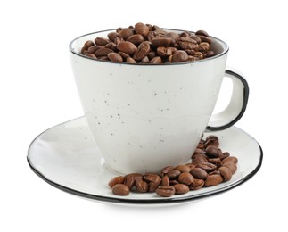Photo of Ceramic cup with roasted coffee beans isolated on white