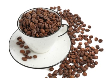 Photo of Ceramic cup with roasted coffee beans isolated on white