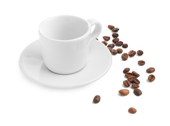 Photo of Ceramic cup with roasted coffee beans isolated on white