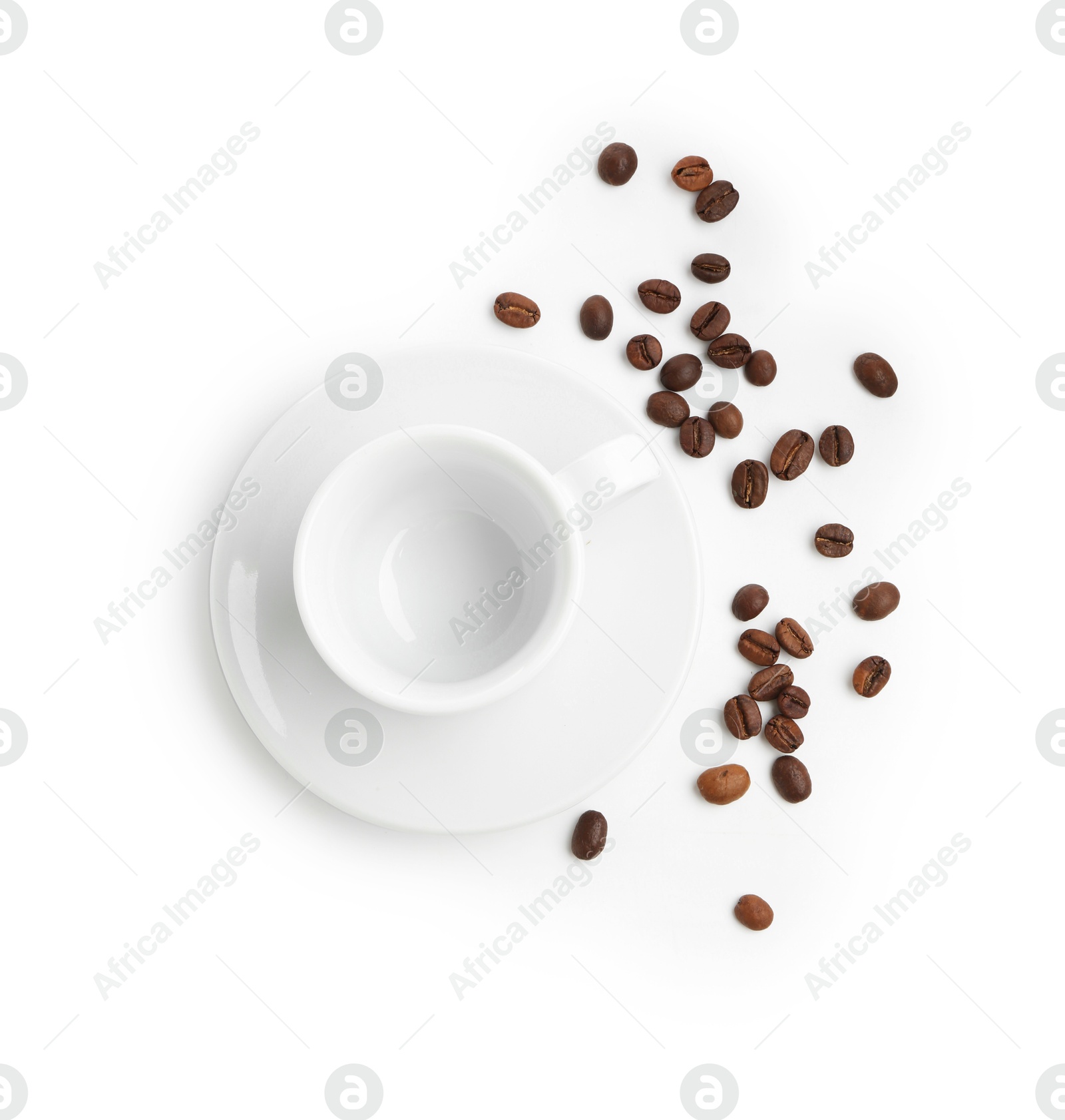 Ceramic cup with roasted coffee beans isolated on white, top view Photo of Ceramic cup with roasted coffee beans isolated on white, top view