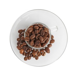 Photo of Glass cup with roasted coffee beans isolated on white, top view