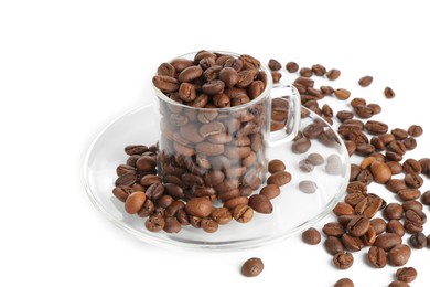 Photo of Glass cup with roasted coffee beans isolated on white