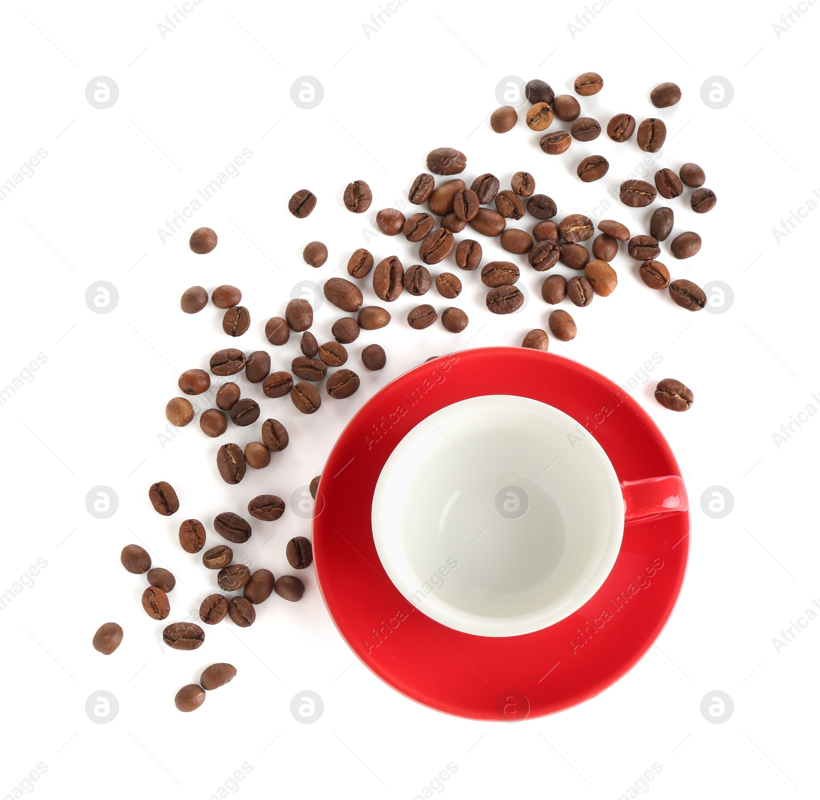 Ceramic cup with roasted coffee beans isolated on white, top view Photo of Ceramic cup with roasted coffee beans isolated on white, top view