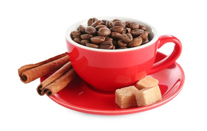 Photo of Ceramic cup with roasted coffee beans, sugar cubes and cinnamon isolated on white