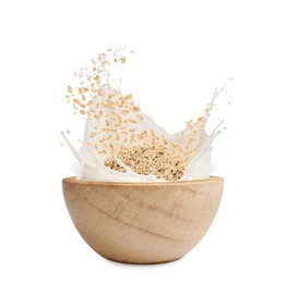 Image of Oats and milk splashing out from bowl on white background
