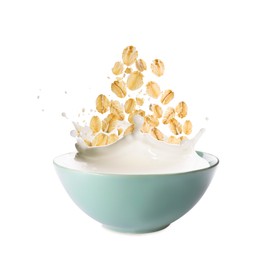 Image of Oats and milk splashing out from bowl on white background