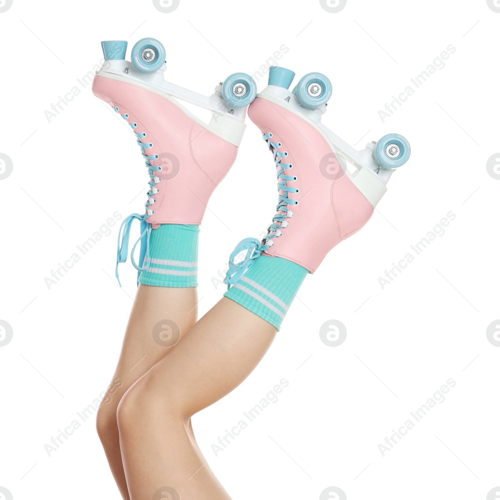 Woman in roller skates on white background, closeup Photo of Woman in roller skates on white background, closeup