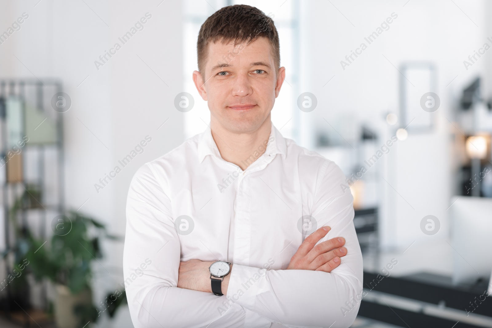 Portrait of handsome middle aged man indoors Photo of Portrait of handsome middle aged man indoors