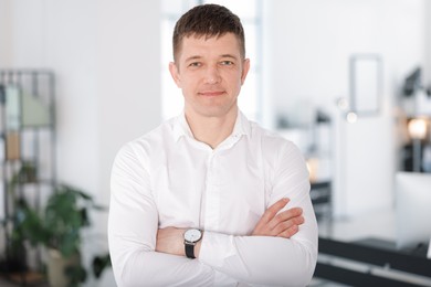 Photo of Portrait of handsome middle aged man indoors
