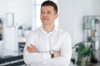 Photo of Portrait of handsome middle aged man indoors