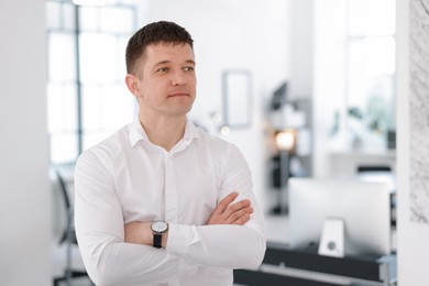 Photo of Portrait of handsome middle aged man indoors. Space for text