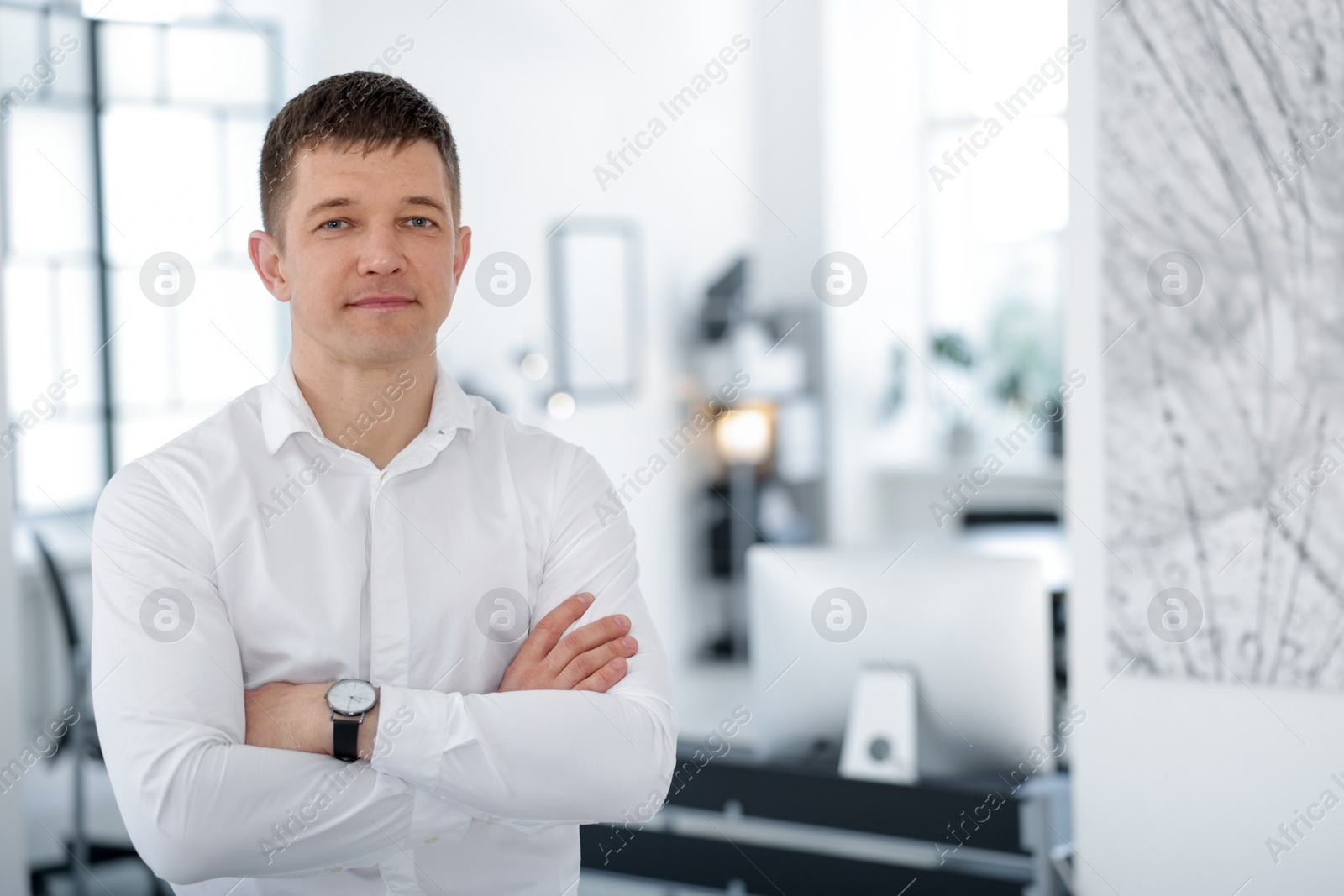 Portrait of handsome middle aged man indoors. Space for text Photo of Portrait of handsome middle aged man indoors. Space for text