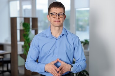 Photo of Portrait of handsome middle aged man indoors